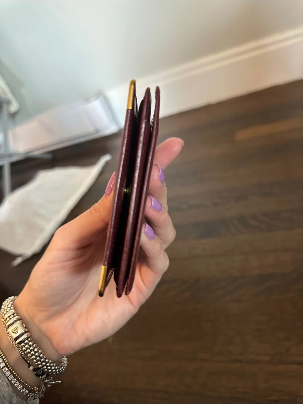 Cartier Burgundy Leather Card Holder with Gold Corners